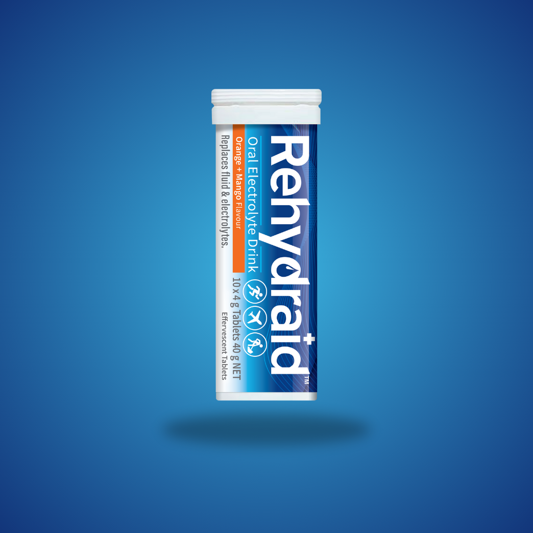 Rehydraid Oral Electrolyte Drink tube containing 10 effervescent tablets in orange and mango flavour. The label shows it replaces fluid and electrolytes, suitable for physical activity and travel."